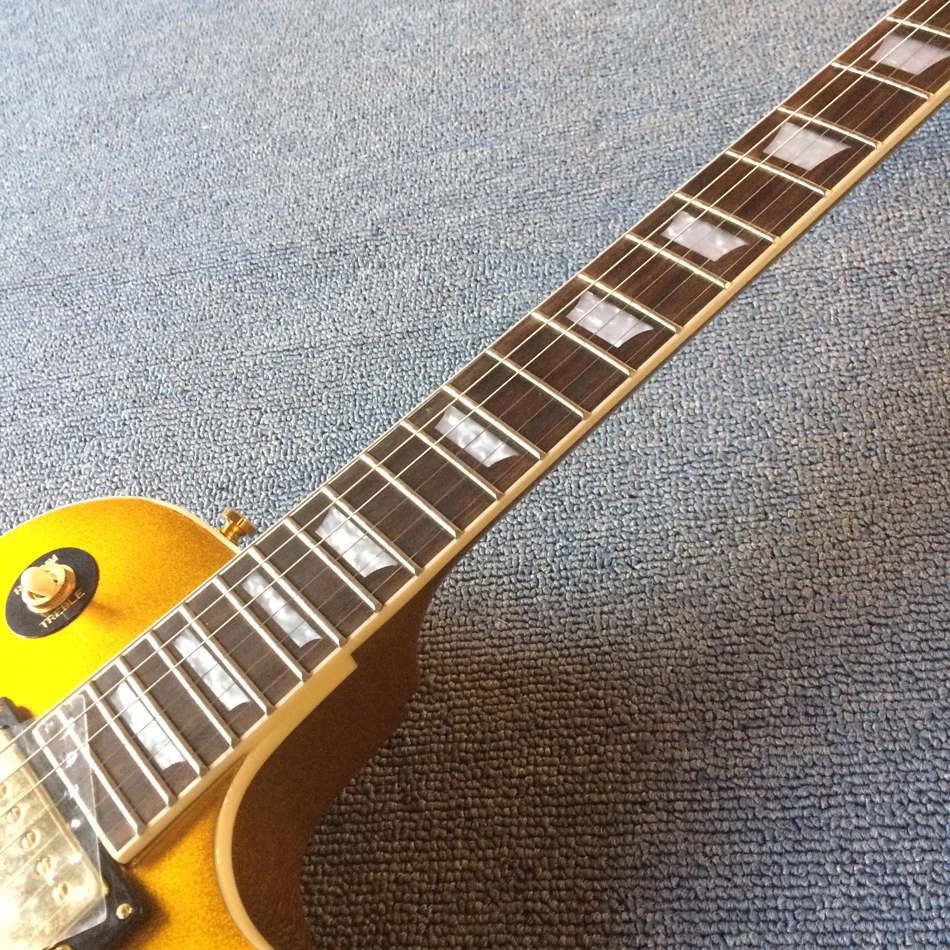 Gold electric guitar, gold hardware with Tune-o-Matic bridge, rosewood fingerboard