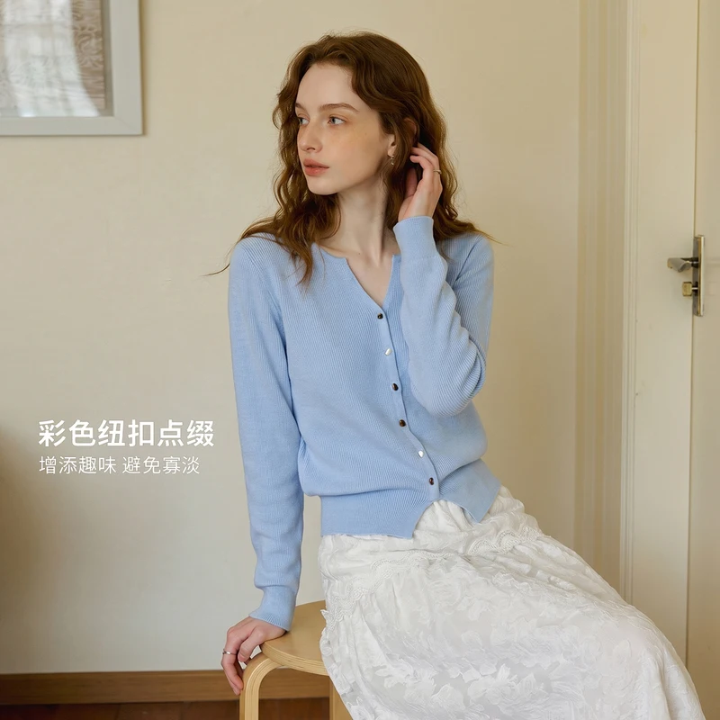 OLrain knitted cardigan 2026 autumn new blue French half-open round V-neck resin buckle foot split O58QZ009582