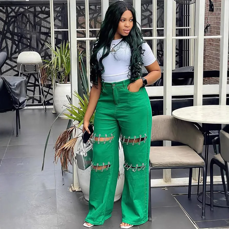 

European and American women's high waisted jeans women's 2026 new style spliced casual hole nail chain pants