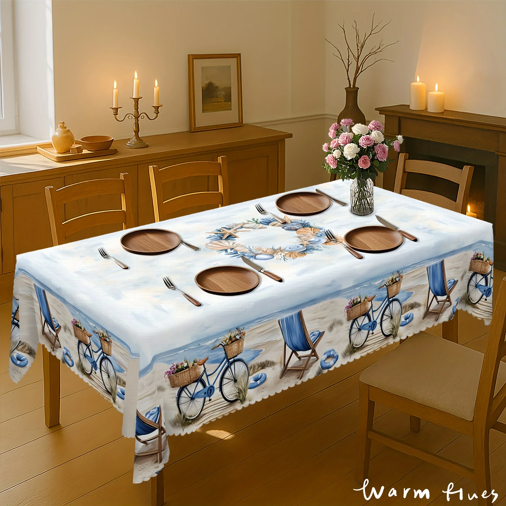 One ocean-themed tablecloth with a coastal and sandy beach scene design. Light blue tablecloth. YZB