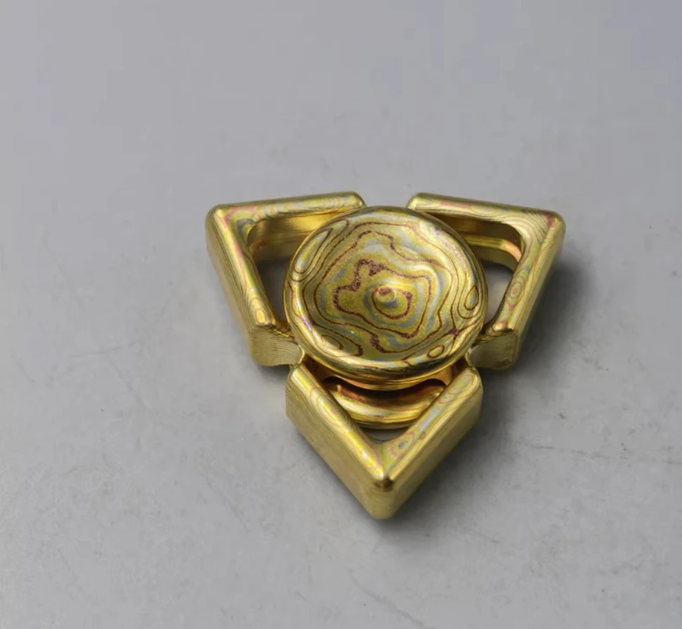 Używany spinner EDC Linglong Mokume, zabawka antystresowa.