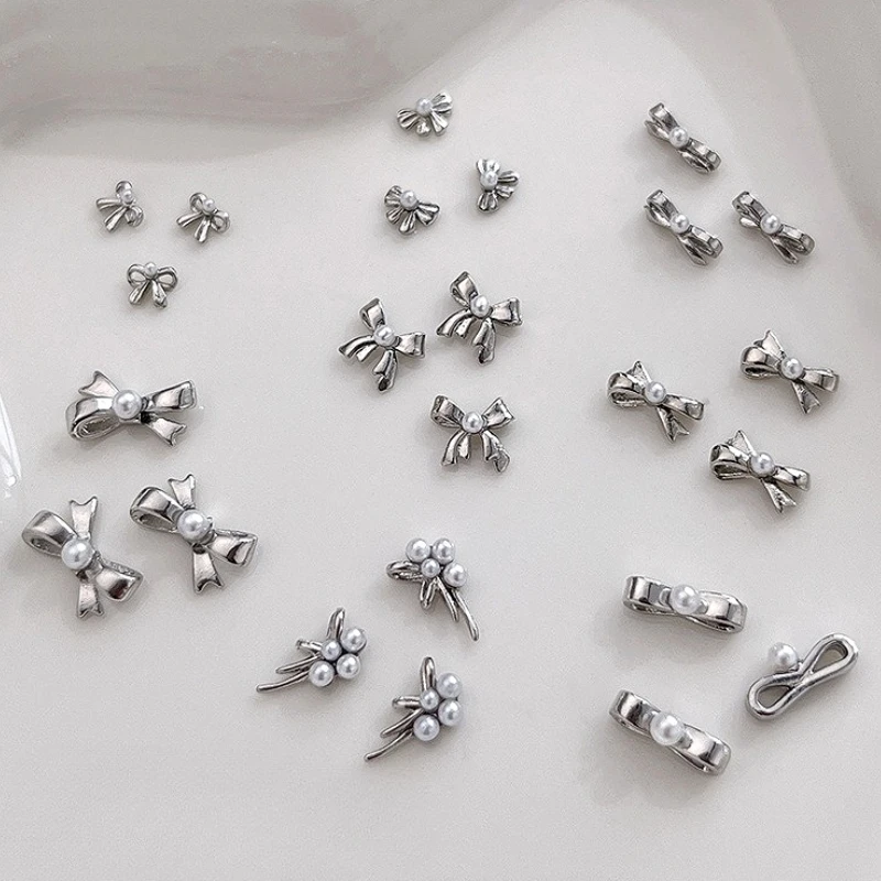 

Delicate Silver Alloy Bowknot Ribbon Bow Tie Metal Nail Art Decorations Rhinestones Charms Manicure Accessories Makeup Wholesale