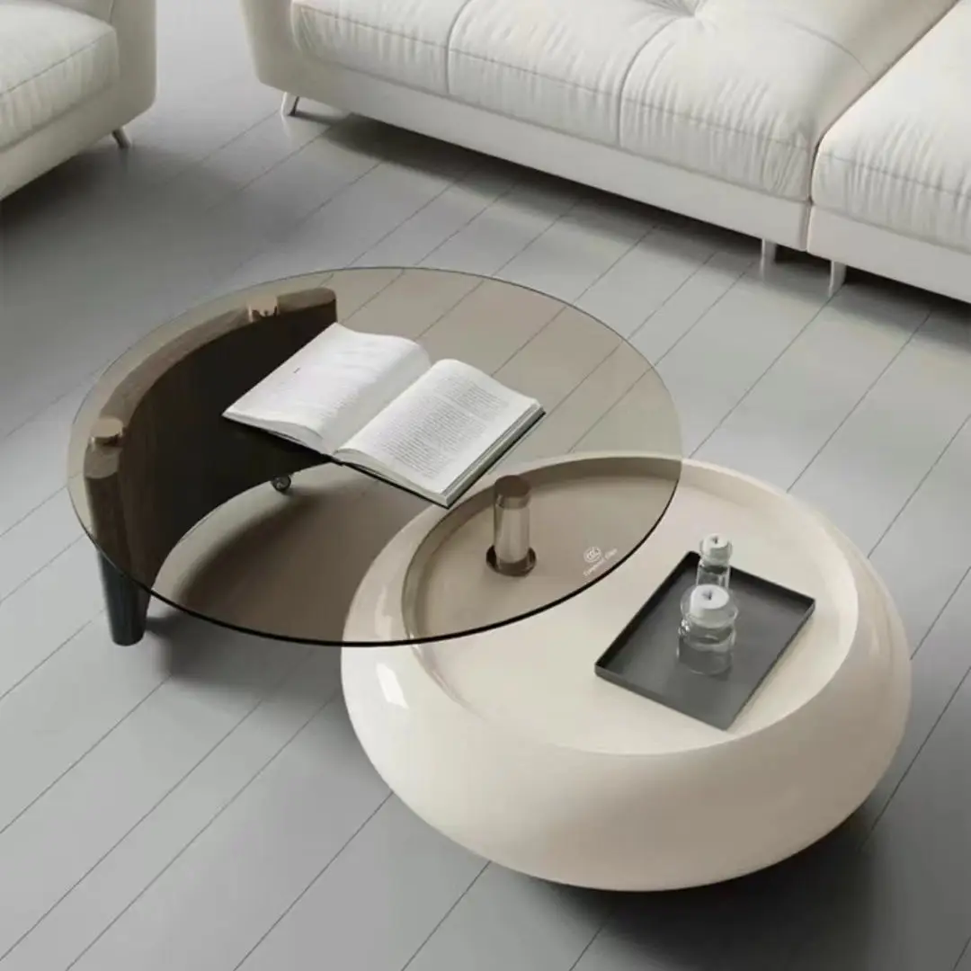 

Rotating cream wind coffee table small apartment living room designer light high sense round tempered glass coffee table