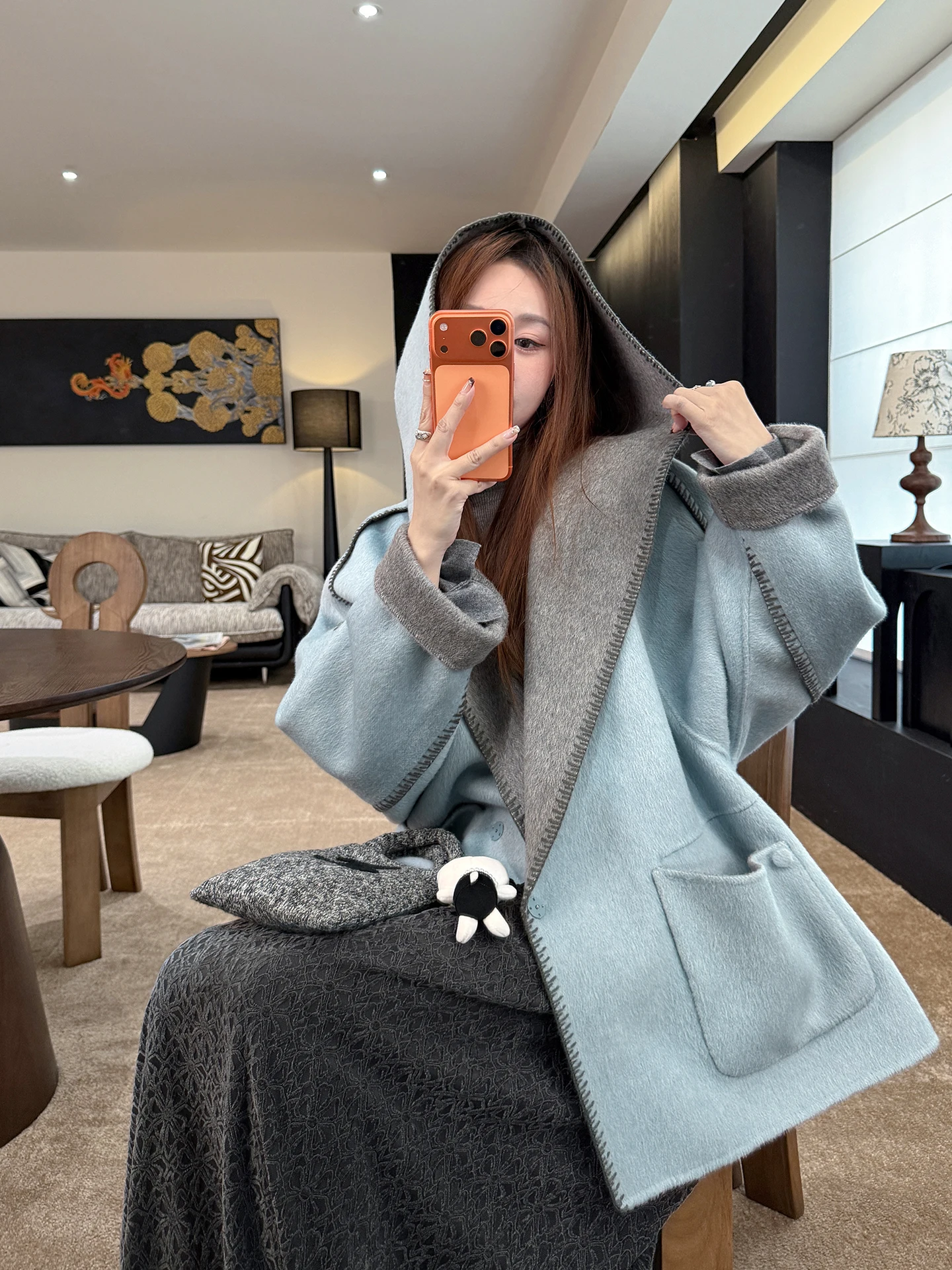 

Double-Faced Woolen Hooded Coat by Zhang ei Winter 2025 New Arrival from Hokkaido Contrast Color Arch Needle Design Korea...
