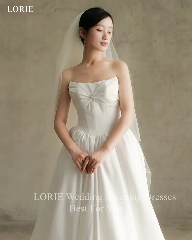 LORIE elegante satijnen strapless trouwjurken a-lijn mouwloze bruid galajurk strik parels geplooide bruidsjurken op maat