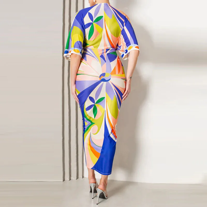 เดรสแฟชั่นสีสันตัดกัน แขนครึ่งตัว ทรงวี คอวี เอวสูง กระโปรงทรงห่อสะโพก ดีไซน์ผ่าข้าง ทรงเข้ารูป ยาว เหมาะสำหรับงานเลี้ยง