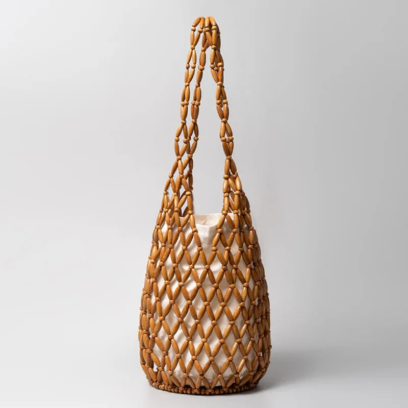 Handwoven women bag 2024 new design hollow out handbag fashion and casual bucket bag shoulder bag