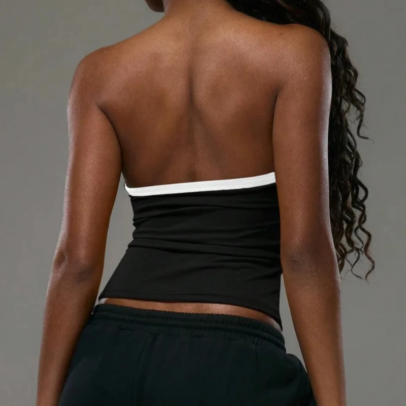 Ragazza calda europea americana con coulisse e lacci, bustier con ombelico esposto, top senza spalline, gilet casual dimagrante con stampa di numeri sexy