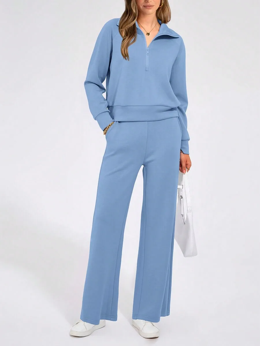 

Женский повседневный спортивный костюм из двух предметов: свитшот на молнии до середины груди и брюки с широкими штанинами