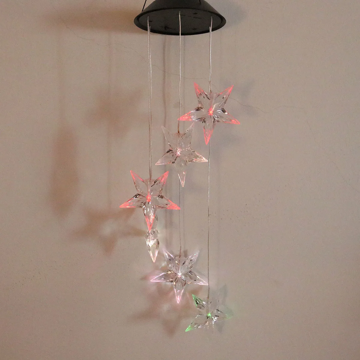 

Hanging Solar Wind Chime Light with 6 Color Changing Stars Rechargeable Operated Outdoor Indoor Decoration Garden