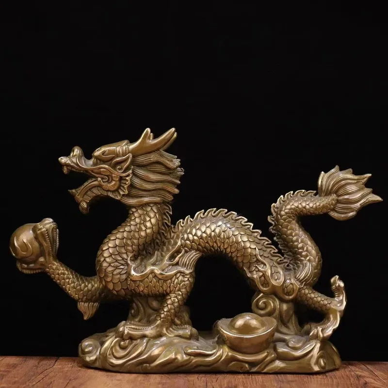 The decorative item is a handicraft made of brass. It features a green dragon, symbolizing attracting customers.