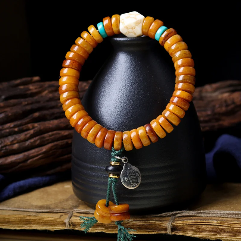 Yak bone bead bracelet with medicinal tablets, Chinese-style bracelet with Bagua charm