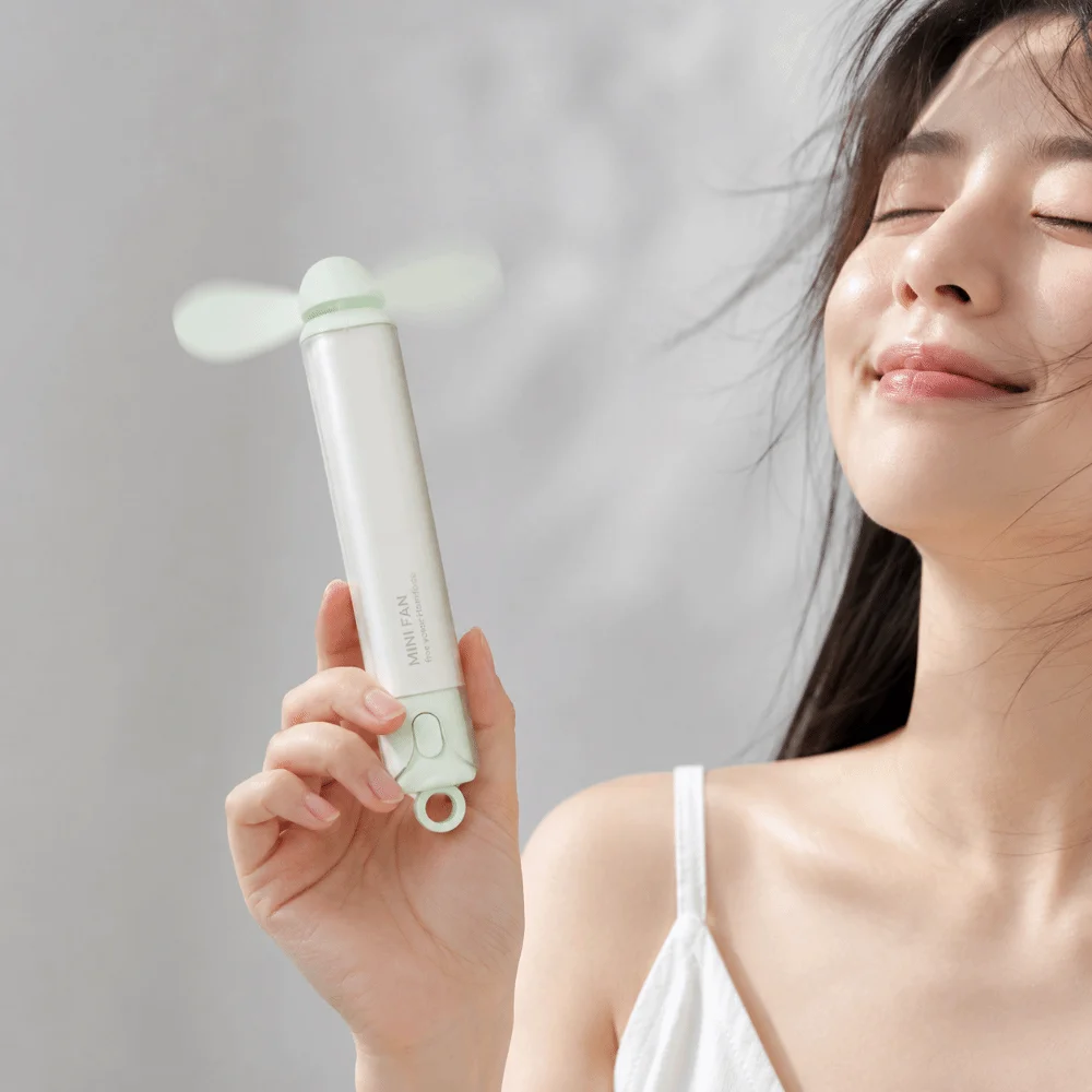Multi-Functional Handheld Mini Handheld Fan Low Noise Portable Mini Electronic Fan Rechargeable Durable Cooling Fan Travel