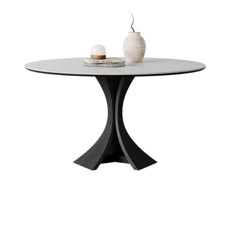 

Pure white rock slab dining table French retro imported light luxury modern 1.2 meters round table Italian style