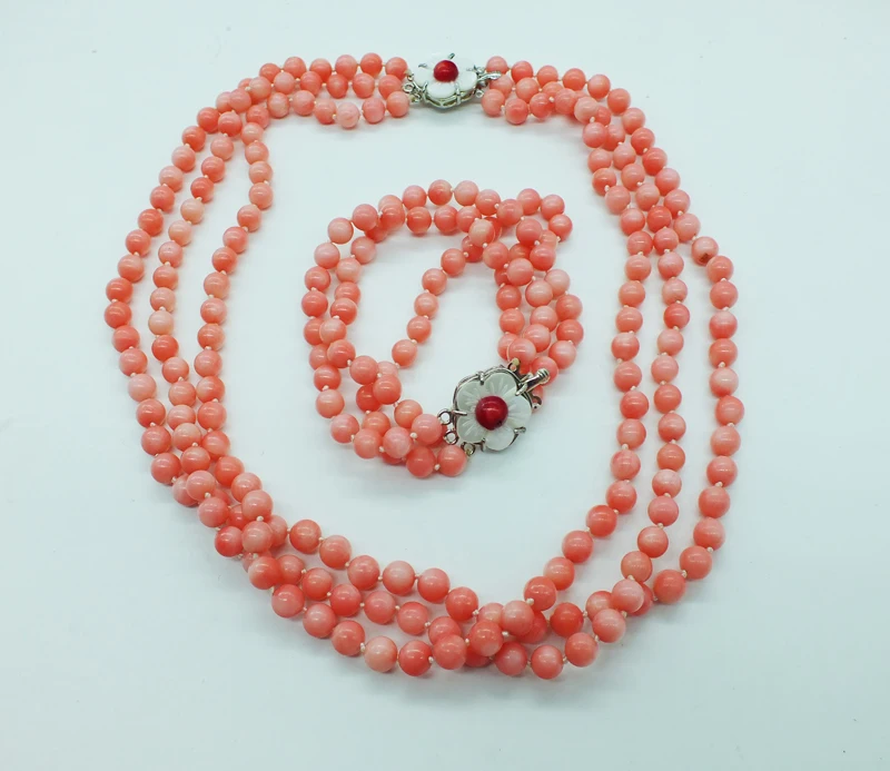 It is great alone, a very classic 6MM pink coral necklace. Bracelet