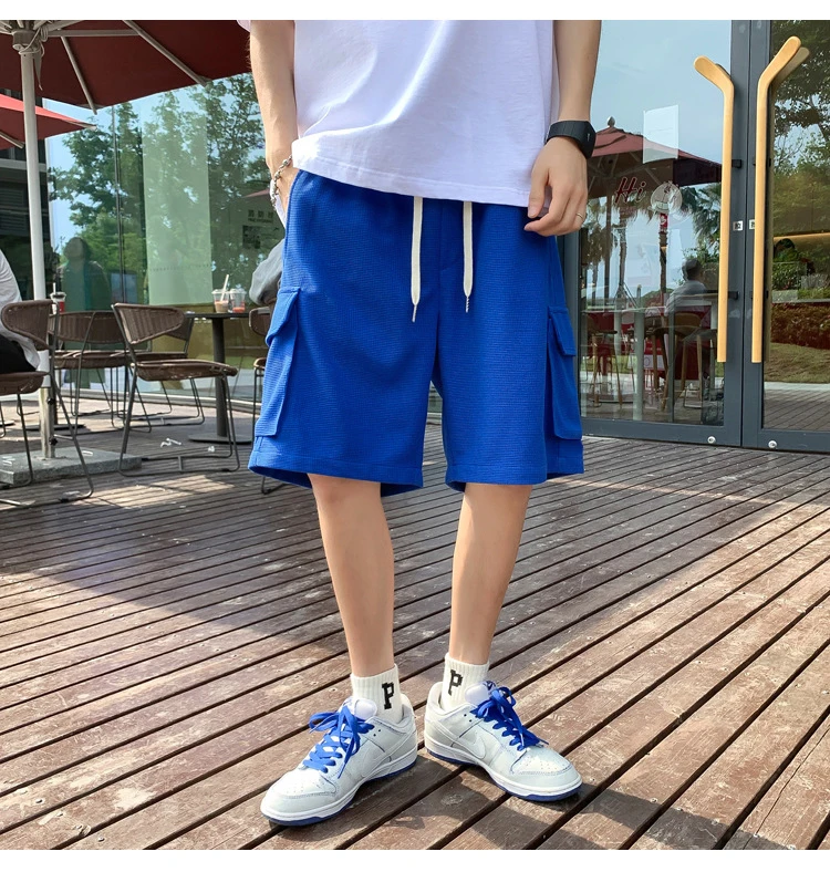 Pantaloncini casual sottili Waffle nuovi pantaloni medi larghi estivi da uomo coppia sport al di fuori per indossare i quinto pantaloni a gamba