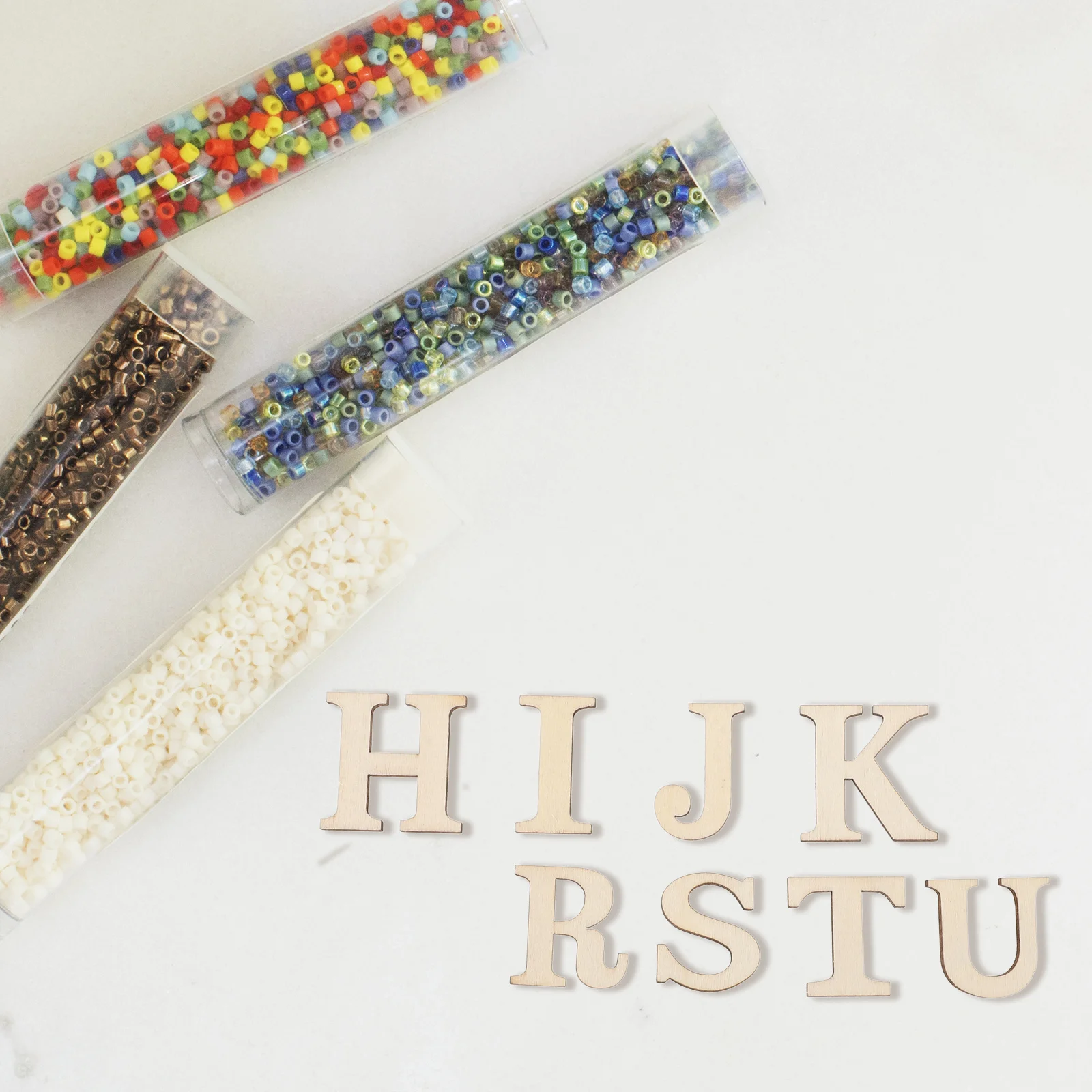 

100Pcs DIY Wooden Letter Cutouts Unpainted Wood Slices Craft Accessories for Home Decor Party Supplies Blank Letter Cutout