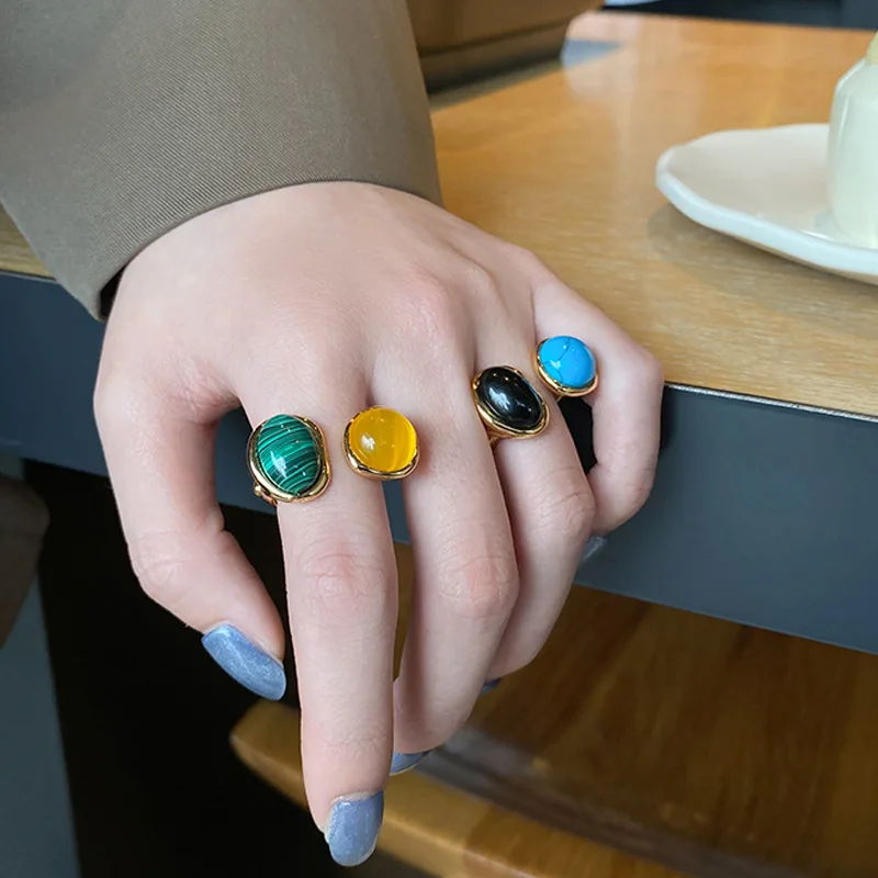 

QMCOCO Silver Color Finger Rings For Women New Fashion Vintage Creative Oval Cat Eye Stone Party Jewelry Birthday Gifts