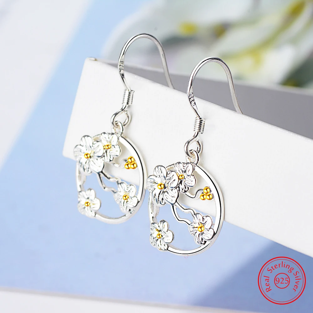 

Quality Jewelry New Lady's 925 Sterling Silver Vintage Hollow Round Flower Drop Earrings FQL25050