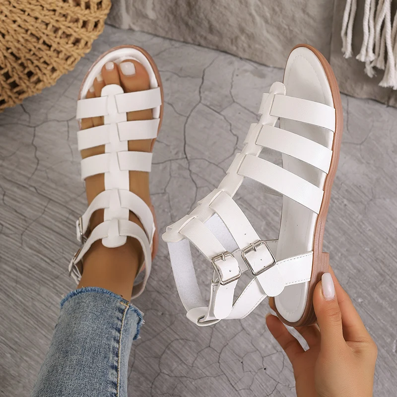 Sandalias romanas ahuecadas para mujer, zapatos de gladiador con punta abierta, cómodos, planos, para vacaciones y playa, a la moda, novedad de verano