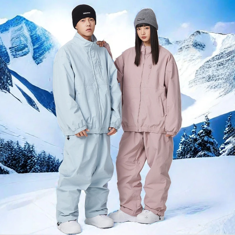

New 2025 Couple Ski Suit Sets Winter Sports Man Snow Clothes Pro Waterproof Windproof Loose Skiing Jumpsuit Warm Woman Tracksuit