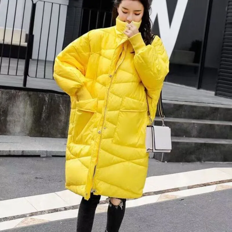 Piumino in piumino d'anatra bianco giallo lucido di fascia alta da donna medio e lungo invernale versione coreana ampia e sottile personalizzata da strada