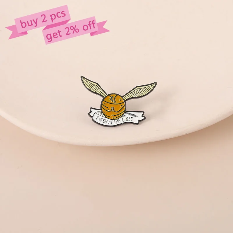 Ball with Wings Enamel Pins Custom Game Brooches Lapel Badges Cool Witch Movie Jewelry Gift for Kids Fans Friends