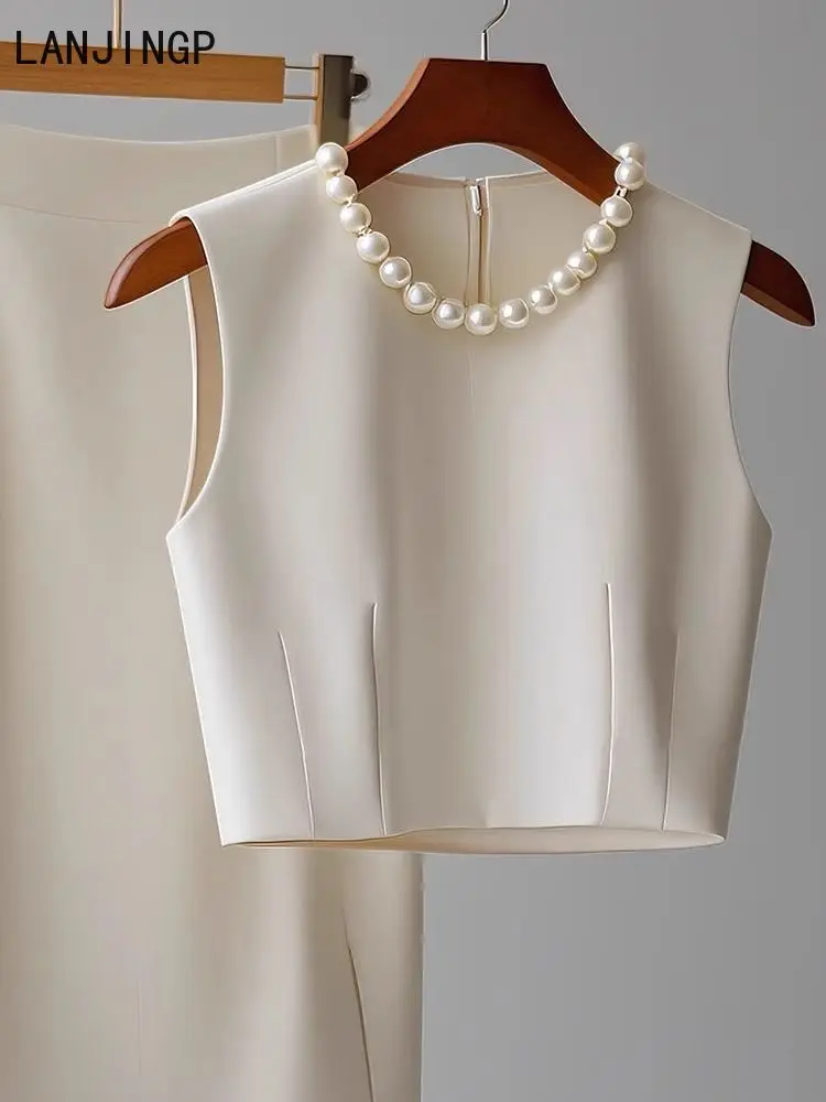 suit skirt two-piece temperament three-dimensional bead sleeveless top stacked with high-waisted skirt