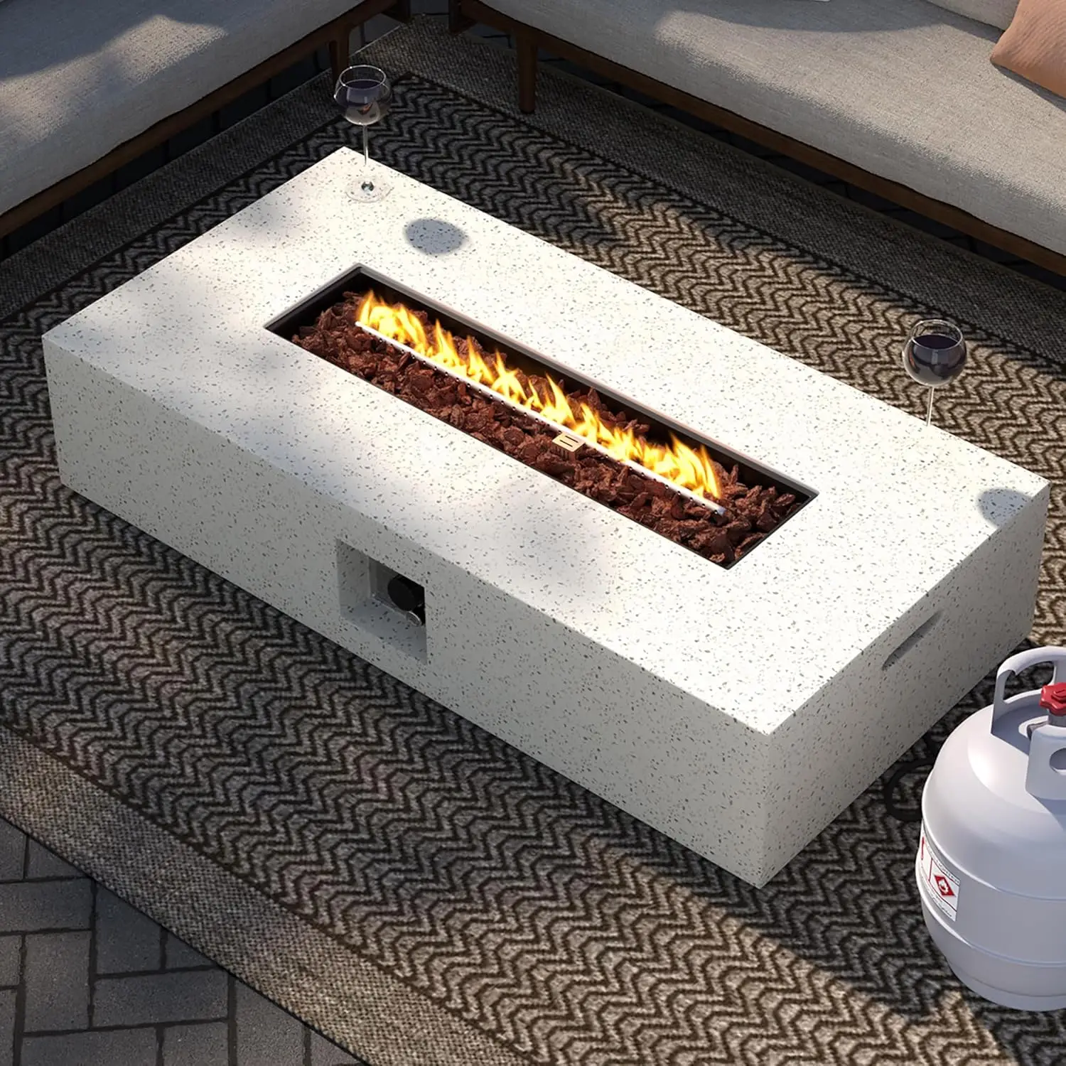 

SUNBURY Outdoor Propane Burning Fire Pit 56 Inch Rectangular Patio Fire Table 50,000 BTU Outside Spotted White W Volcanic Rock