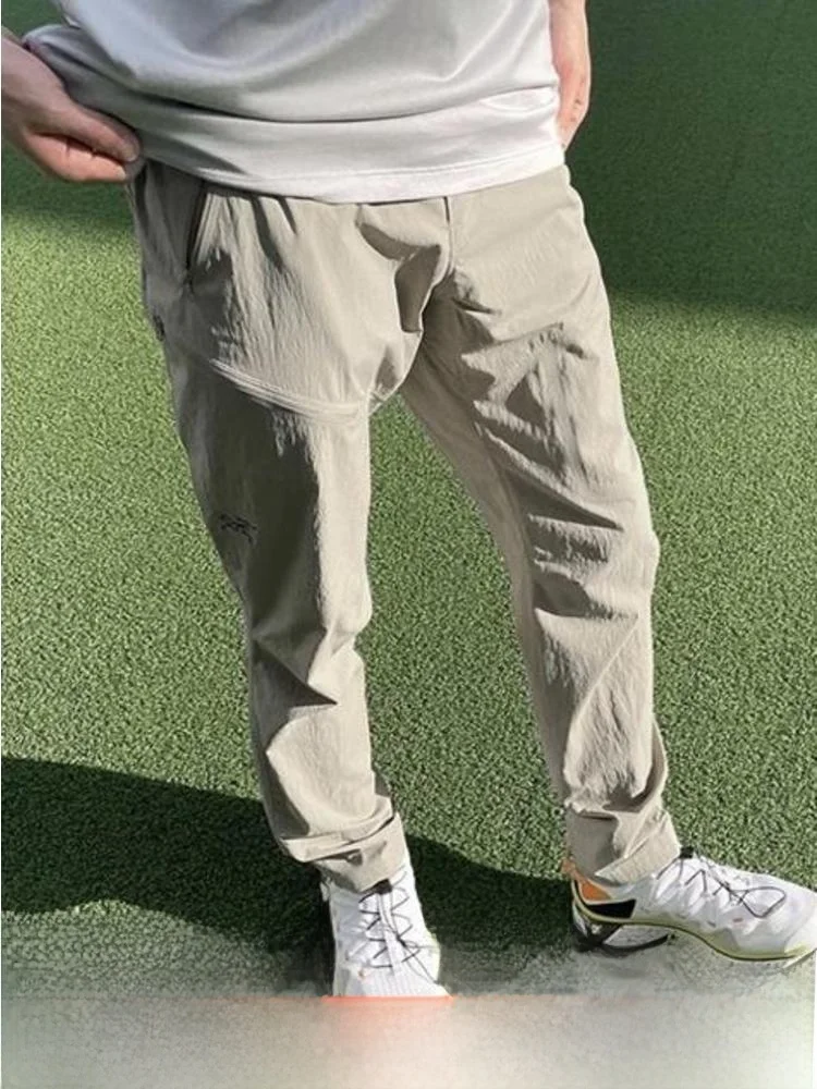 

Легкие повседневные брюки из софтшелла для улицы, спортивные ветрозащитные модные молодежные длинные брюки с несколькими карманами для активного отдыха