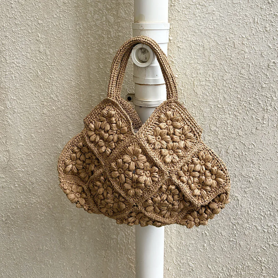 Hand crocheted three-dimensional flower straw tote bag gentle khaki pastoral summer vacation handbag.