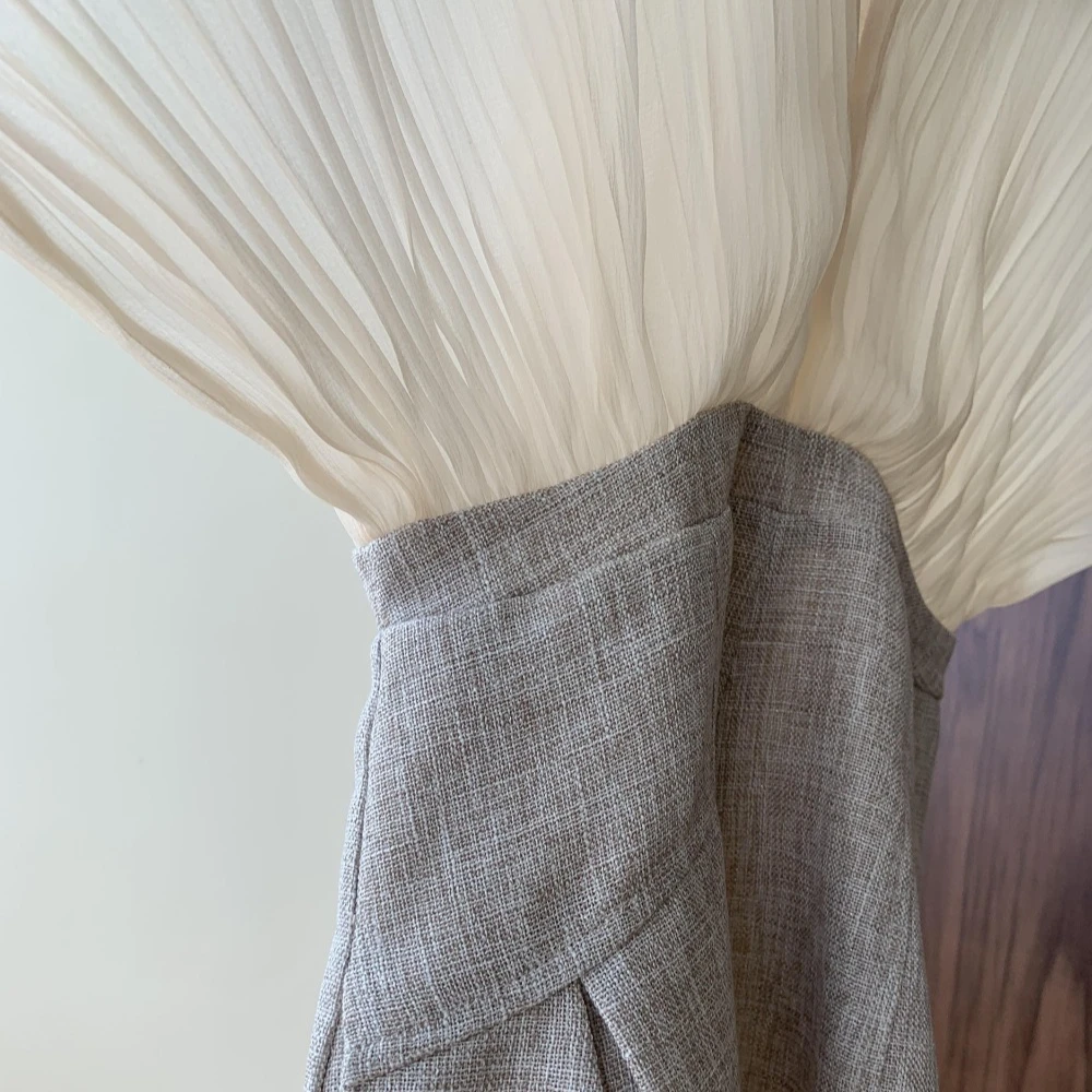 กางเกงขาสั้นจั๊มสูทแขนสั้น Niche Pleated Bat Sleeve สําหรับผู้หญิง