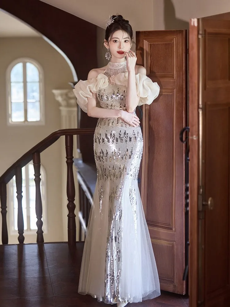 A halter-neck one-shoulder fishtail light luxury niche adult host's silver sequined dress