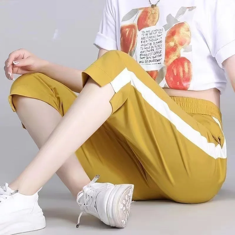 Ice Silk Quick Drying Children's 2024 Summer New Item, Color Blocking Versatile Sports Pants, Casual Harun Thin Seven Inch