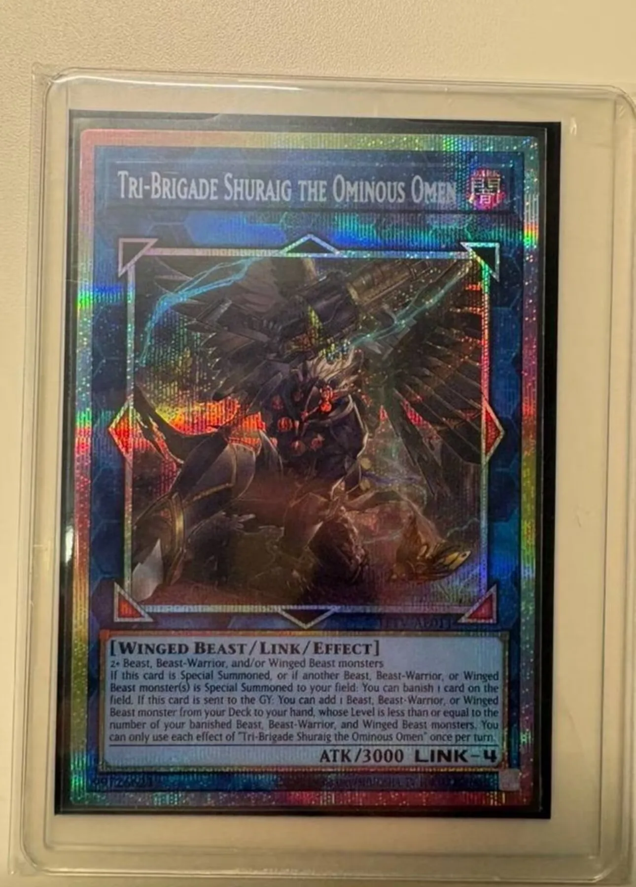 yugioh-konami-duel-monsters-tftv-ae010-tri-brigade-shuraig-the-ominous-omen-prismatic-secret-asian-english-collection-carte-prenouvelee