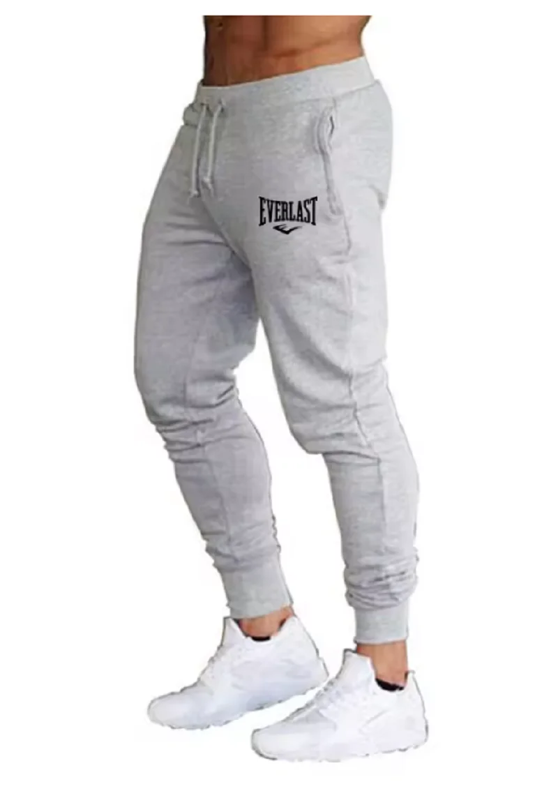 السراويل الجديدة المطبوعة الخريف EVERLAST الرجال/النساء تشغيل السراويل ركض Sweatpant الرياضة بناطيل كاجوال اللياقة البدنية الصالة الرياضية تنفس السراويل