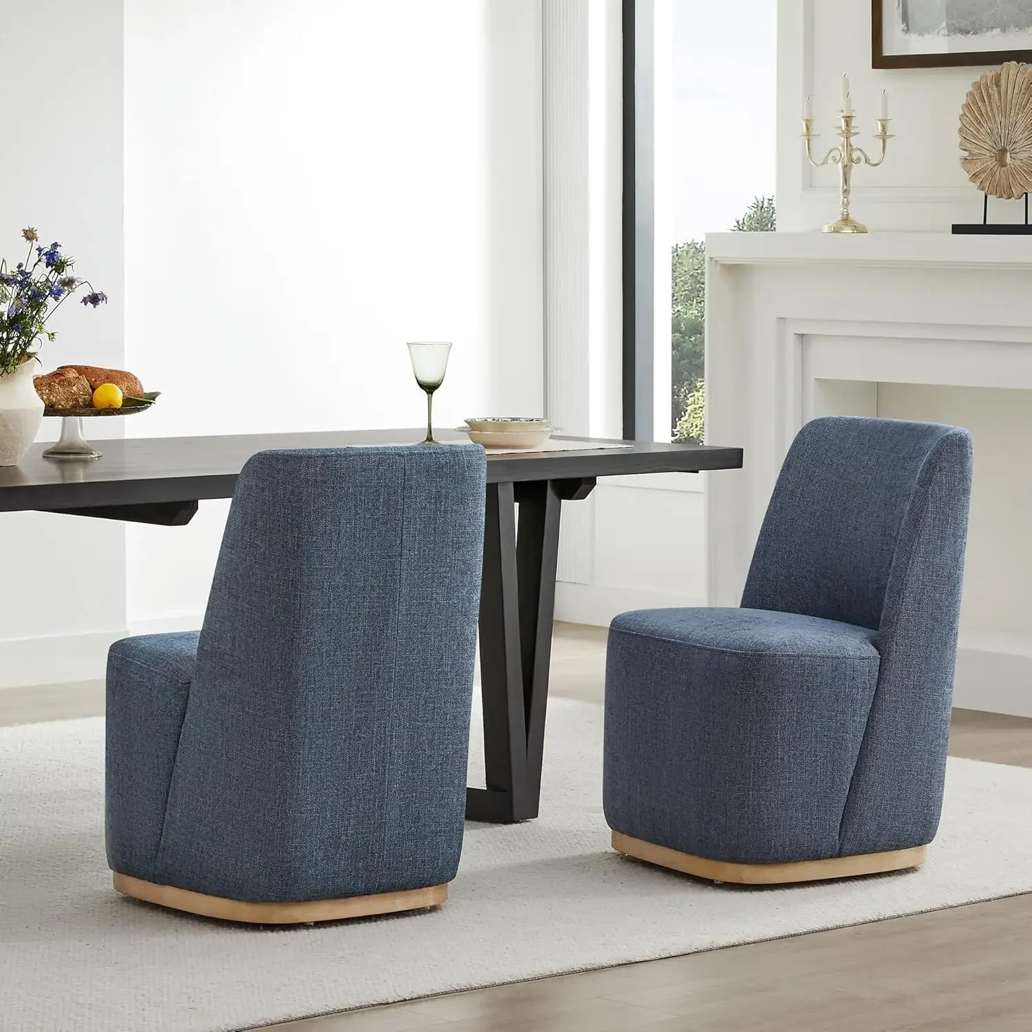 CHITA FSC certified set of two Boucle dining chairs with casters for reading rooms, lounges, kitchens, and restaurants