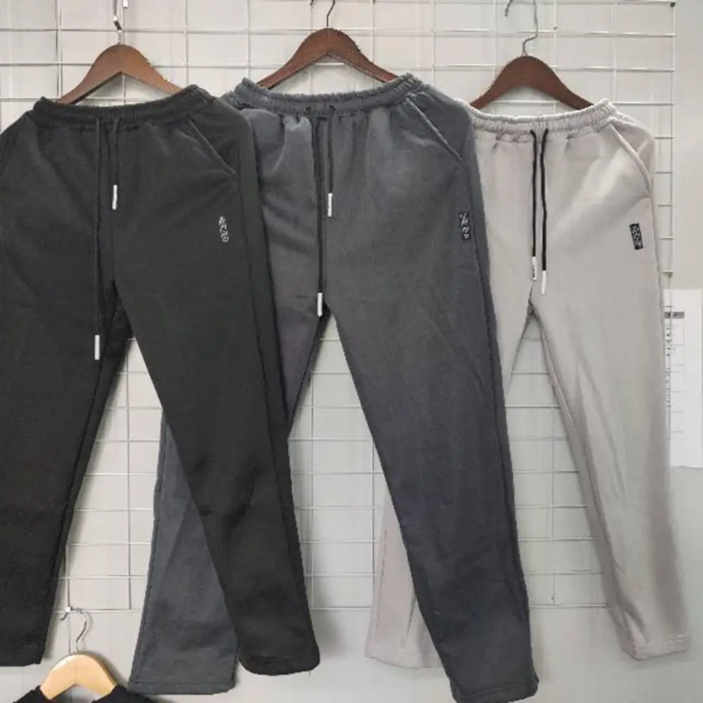 Winter Men Pants Solid Color Elastic Waist Plush Lining Long Pants Windproof Thicken Mid Waist Sweatpants Streetwear