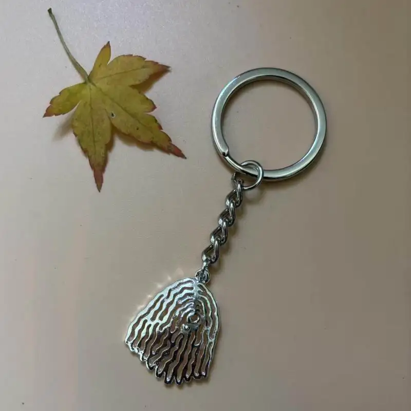Llavero con colgante de animal de perro Komondor de metal de moda para hombre