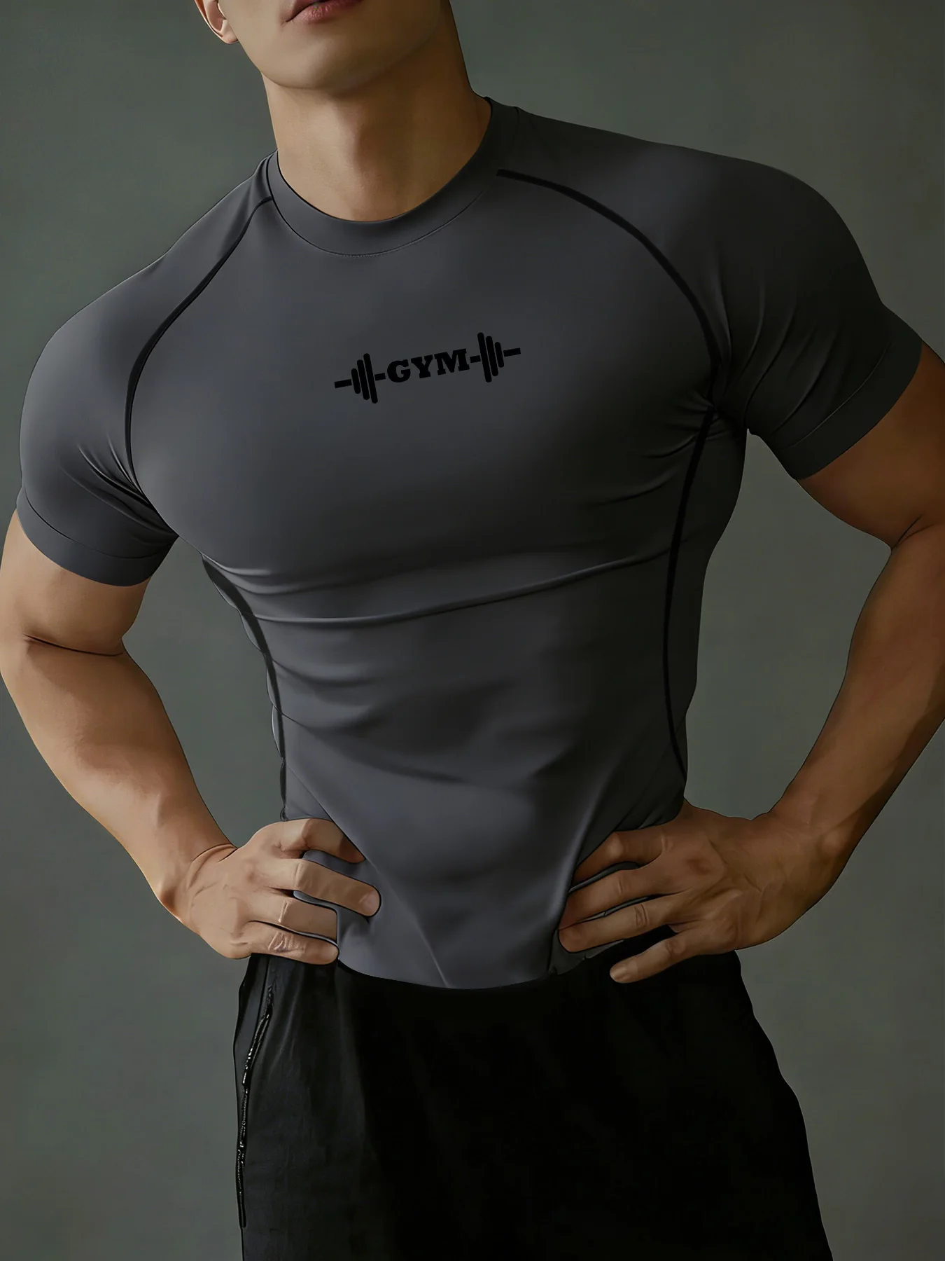 Men's athletic compression workout T-shirt with dumbbell strength print, suitable for gym training, running, and yoga.