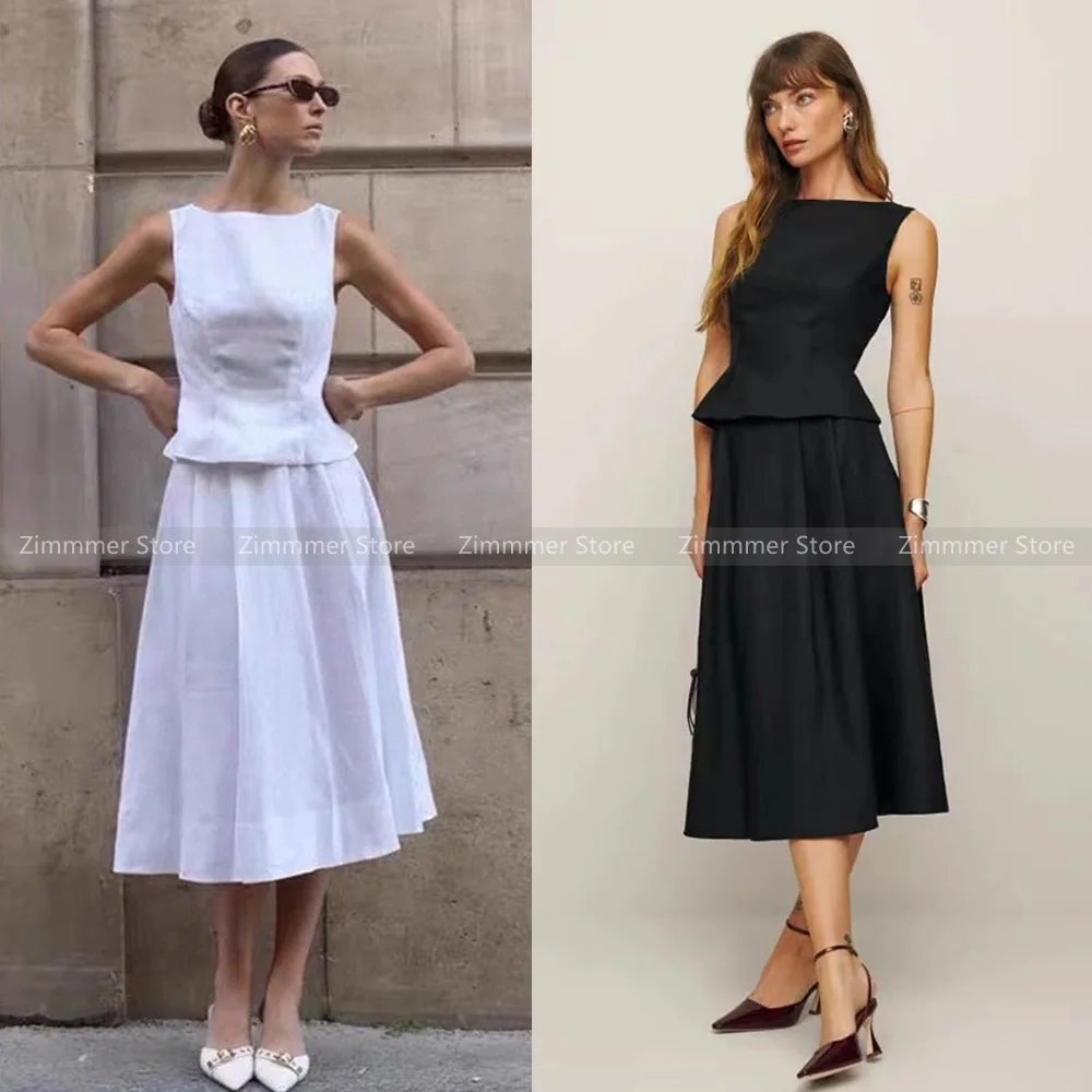 

French temperament one-line collar three-dimensional cut waist tank top + pleated umbrella linen half-skirt set for women