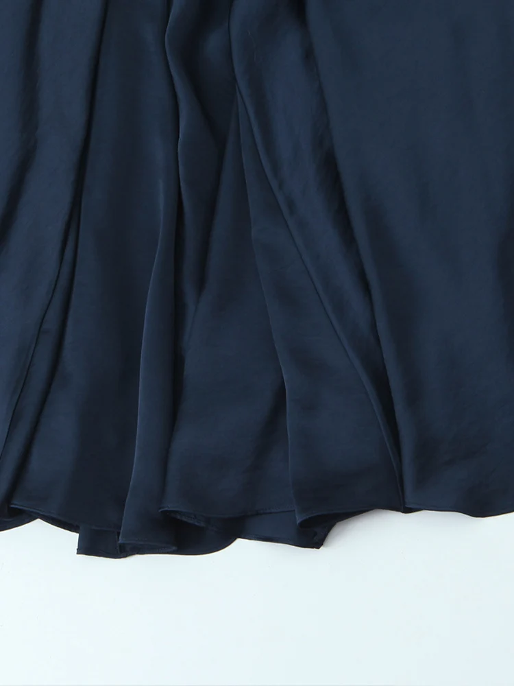 Nueva moda femenina de estilo europeo, vestido largo versátil y elegante de color sólido con cuello en V y tirantes finos con textura satinada de seda.