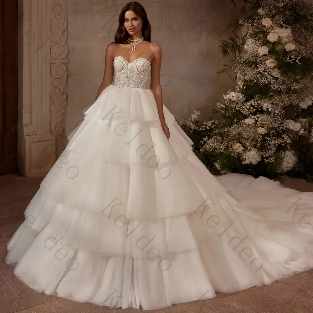 Customized Strapless A-line Sleeveless Wedding Dresses Appliques Beaded Tiered Tulle Lace Up Open Back Floor Length Bridal Gowns