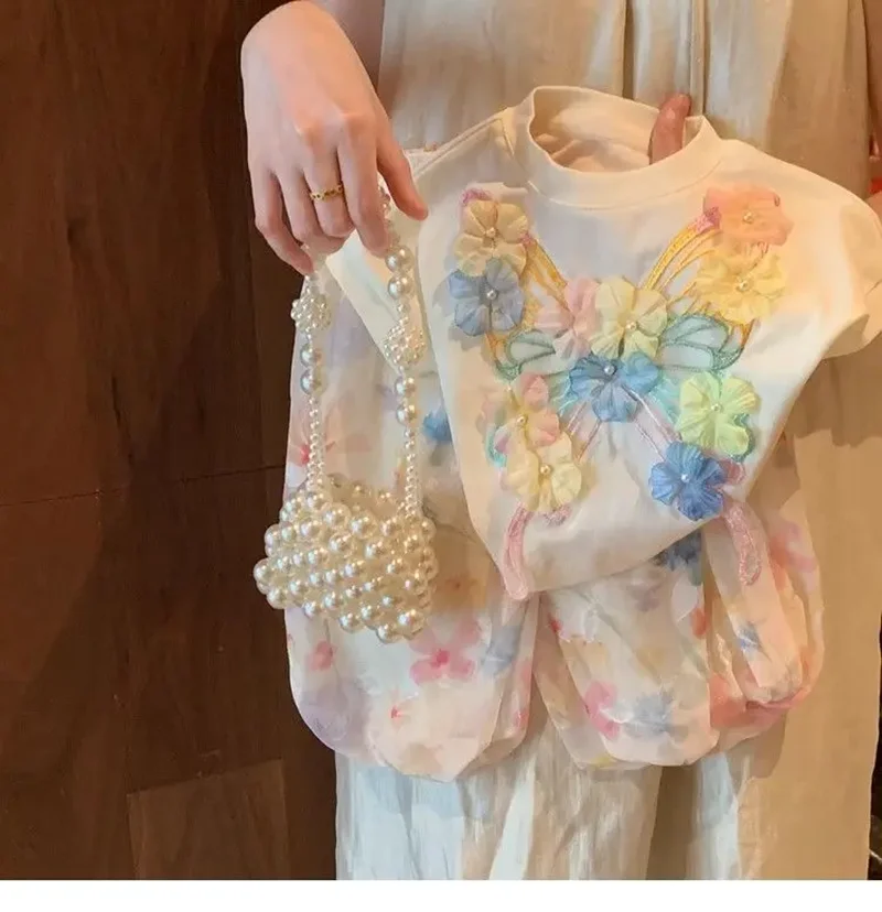 

Girl Set Summer 2026 New Children's Baby Butterfly Flower Short sleeved Top+Lantern Pants Two piece Set