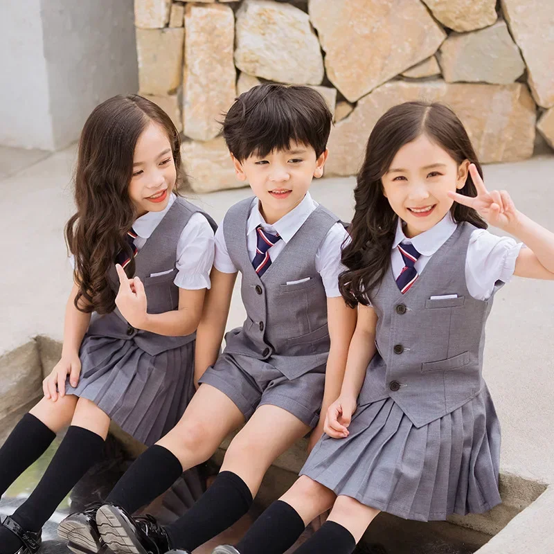 Kinder koreanische Schuluniform Jungen Mädchen Falten rock Weste Top Kinder Performance Kleidung Set Bühne tragen Studenten uniform Outfit