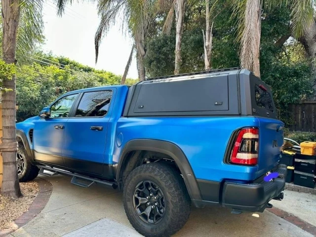 

Factory Wholesale Navara & Tundra Model Hard Top Pickup Truck Canopy Durable Waterproof Custom Flip Top Cover Smart Cap Canopy