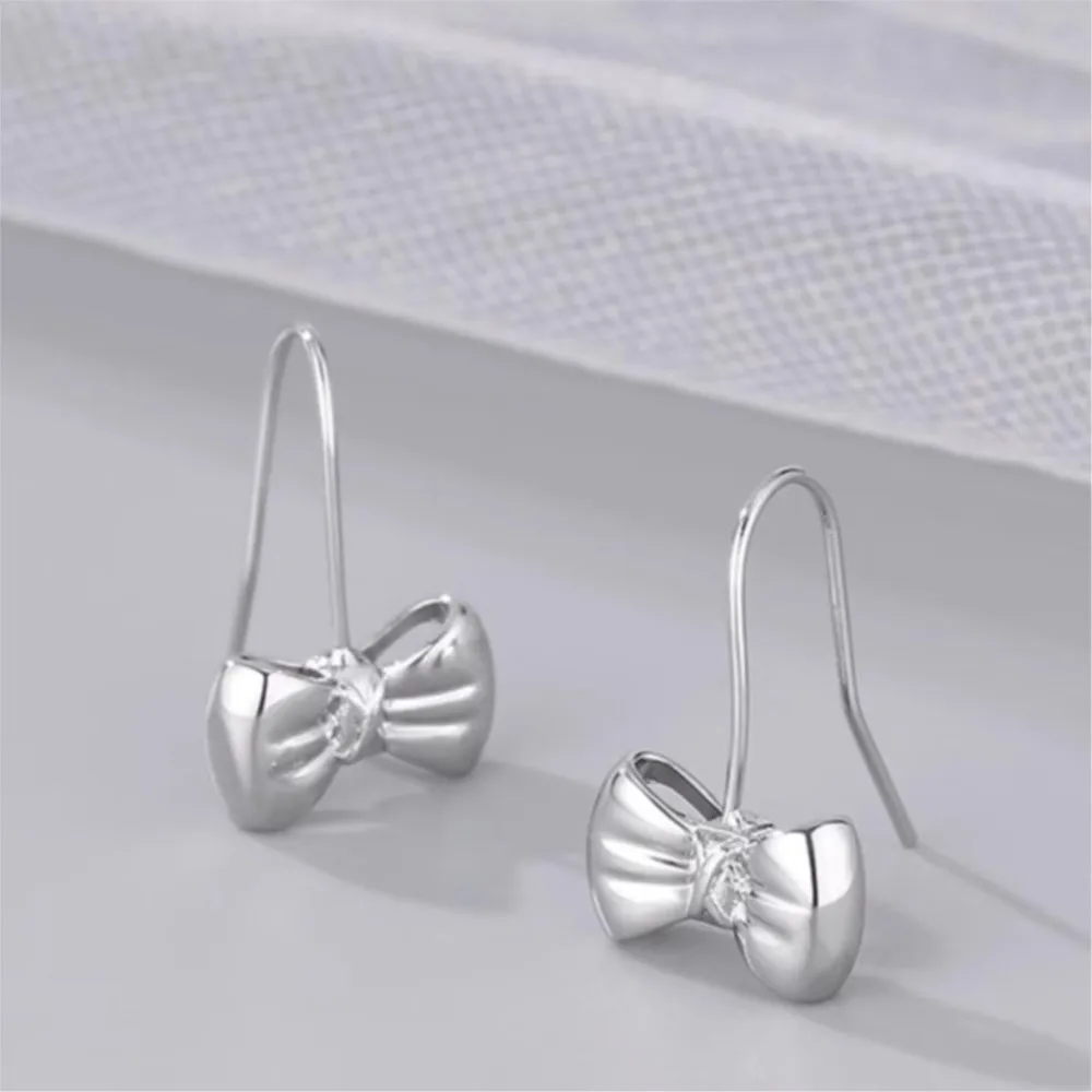 

PANJBJ 925 серебряные серьги-капли с бантом для женщин, минималистичные серьги Ins для творчества, универсальные офисные украшения, подарок для вечеринки, дропшиппинг