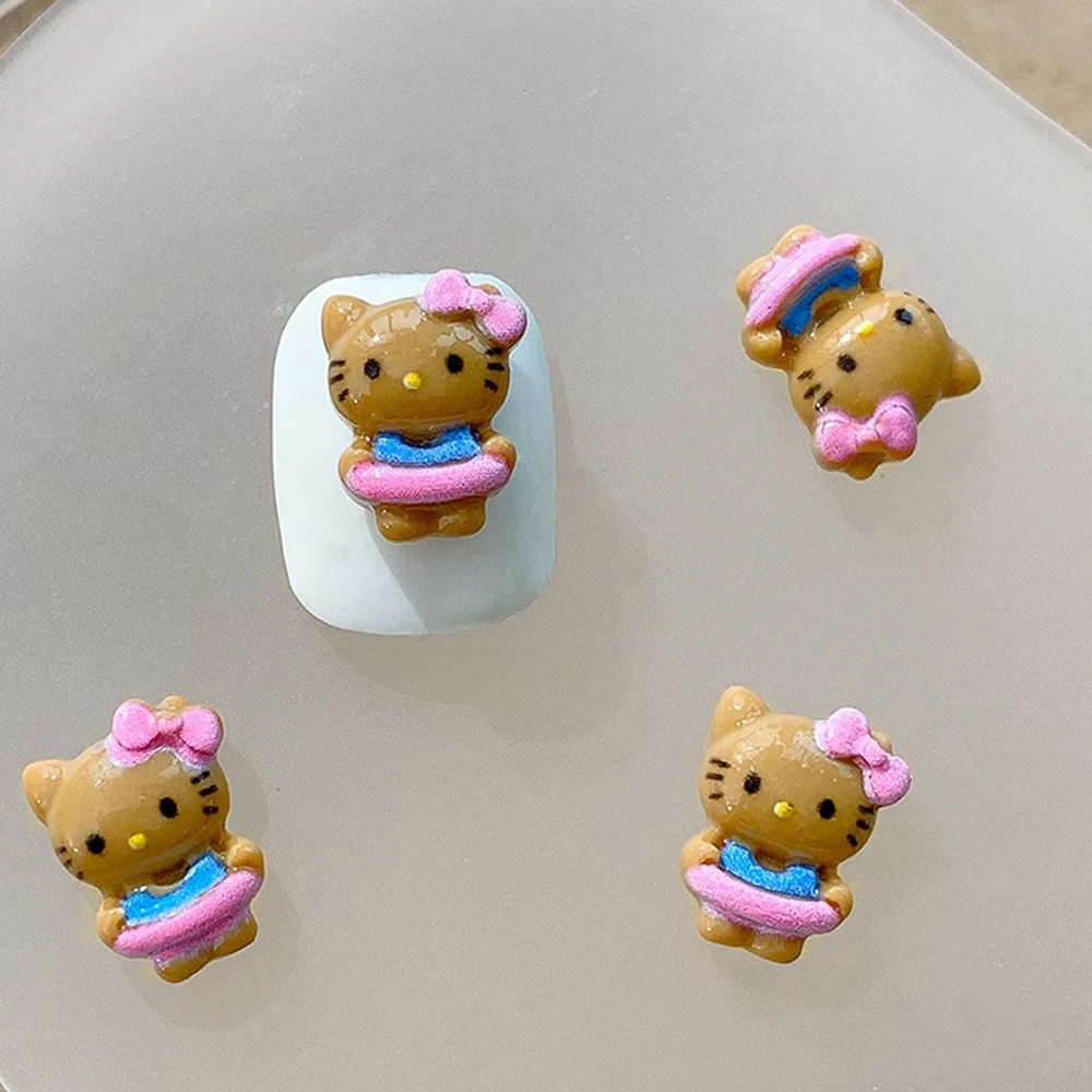 100pcs 3D ฮาวายฟอกหนัง Kitty ตกแต่งเล็บน่ารักบิกินี่ HelloKitty สีชมพูว่ายน้ํากระโปรงเล็บ Charms Y2K ฤดูร้อนเล็บอะไหล่