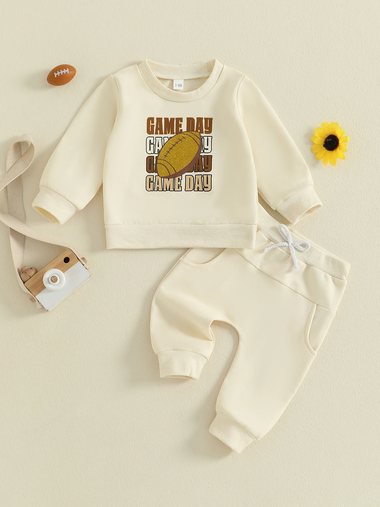 

Adorable Infant Boys Autumn Ensemble Featuring Stylish Rugby Top and Embroidered Letter Design Paired with Matching Solid