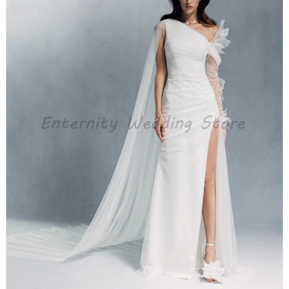 

White One Shoulder Mermaid Wedding Dress 2026 Luxury Ruched Tulle Cape Sleeve Sheath Bridal Gown With High Slit